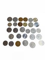 All coins laid out in rows on white background