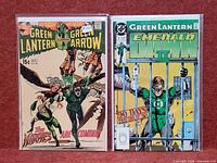 Both comic books front covers in bags and boards