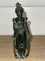 Full view of jadeite Guanyin figurine standing