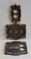 Three Amerock Carriage House wall plates stacked: duplex, triple toggle, combination