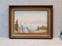 Framed watercolor front view showing artwork and ornate frame