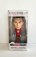 Front view of boxed Sheldon Cooper bobblehead