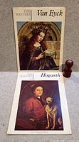Front covers of both The Masters books Van Eyck and Hogarth