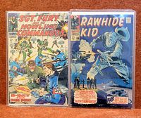 Front view of both bagged comics: Sgt. Fury #59 left, Rawhide Kid #66 right