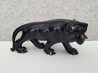 Left side view showing full panther form and finish