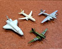 Group shot of all four diecast aircraft on surface