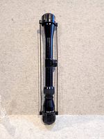 Full view of Tasco rifle scope front to rear