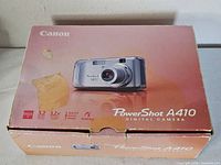Retail box front displaying Canon PowerShot A410 branding