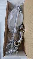 boxed chrome shower extension arm and joints in plastic