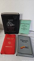 Front covers of all four railroad rule and instruction books
