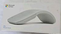 Retail box showing Microsoft Surface Arc Mouse image and branding