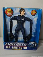 Front of boxed Mr. Fantastic figure showing figure and features