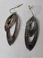Front view of both sterling silver layered oval earrings