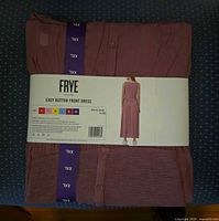 Folded FRYE dress in packaging showing brand, style and size tags