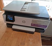 HP OfficeJet Pro 8130e printer on table