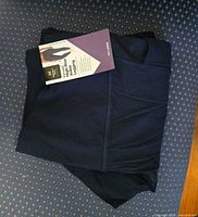 Leggings folded with retail hangtag
