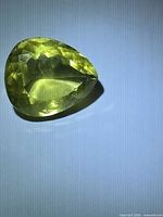 Top view of faceted lemon citrine showing overall shape and color