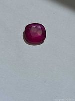 Ruby front view showing cushion cut facets