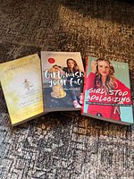 Front covers of three paperback books