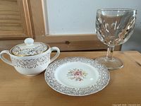 Front view of sugar bowl, goblet and plate