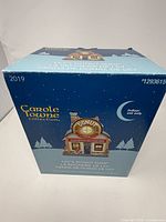 Retail box showing brand, model number, year and building image