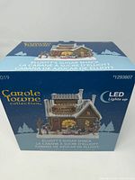 Front of original box showing product image and branding