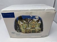 Front of original Department 56 box showing product image and branding