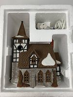 Building and power cord in styrofoam insert