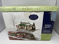Box front showing Department 56 Home For The Holidays Express set artwork