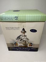 Box front showing Department 56 Silent Night Church branding