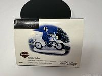 Front of original box showing product name and image