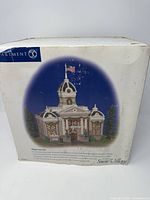 Retail box front showing illustration of Town Hall