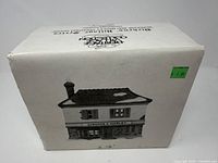 Outer cardboard box showing product name and illustration