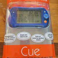 Front view of sealed Cue digital timer showing LCD and features