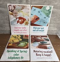 All four posters laid out front view