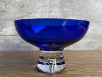 Full side view of cobalt blue pedestal bowl