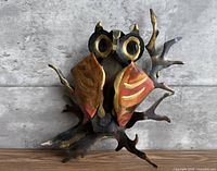 front view showing owl shape, color, branching base