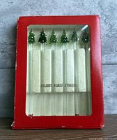 Boxed set of five glass stirrers with green Christmas tree tops