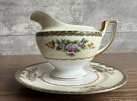 creamer on saucer, side view