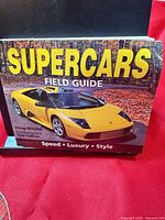 Front cover displaying title, author, and Lamborghini image