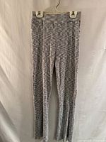 Full view of ribbed space-dye wide-leg leggings hanging