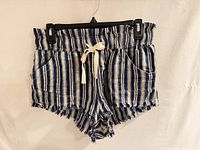 Front view of BDG blue and white striped drawstring shorts showing waistband, pockets, frayed hems
