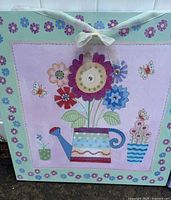 Front view of Colleen Karis floral & butterflies canvas