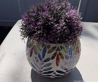 full view of planter with artificial plant