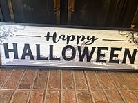 Front view of entire sign showing text and frame