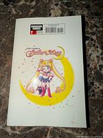 Back cover with Kodansha Comics logo and barcode