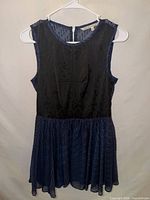 Full front view of dress on hanger