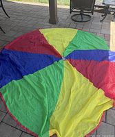 Parachute laid out showing full multicolor sections
