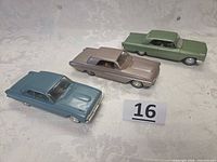 Overall view of three plastic model cars