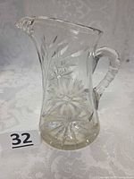 Full view of crystal pitcher showing pattern and shape